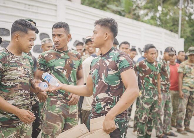 Jaga Kebugaran, Satgas TMMD Ke-129 Bagikan Minuman kepada Anggota