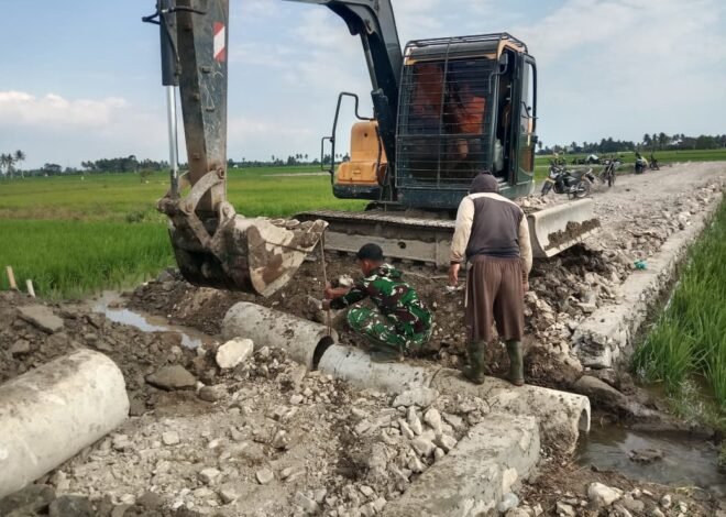 Dikebut Hingga Tuntas! Satgas TMMD Ke-129 Kodim 1404/Pinrang Gunakan Excavator Pasang Gorong-Gorong