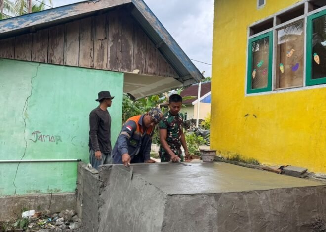 Satgas TMMD dan Warga Lanjutkan Pemasangan Dudukan Tandon Air Program Manunggal Air Bersih di SDN Desa Pulau Dua
