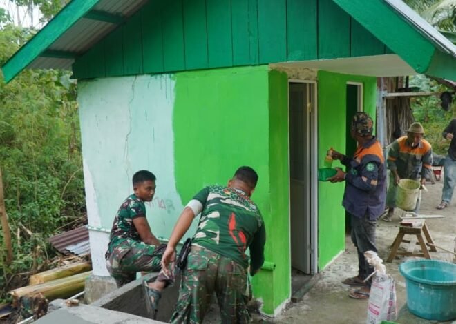 Pengecatan Dinding MCK SDN Desa Pulau Dua, Bukti Nyata Kinerja Satgas TMMD