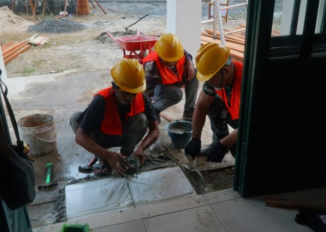 Musholla Darul Iman Masuki Tahap Finishing, Satgas TMMD Ke-129 Mulai Pasang Keramik