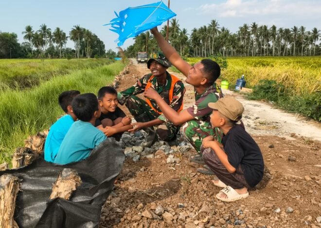 Gelak Tawa di Sela Material: Saat Satgas TMMD Jadi “Sahabat Bermain” Anak Desa Bandar Raya