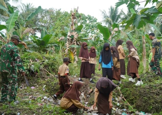 Kerja Bakti Satgas TMMD dan Siswa SDN Umbele Wujudkan Lingkungan Sekolah Bersih dan Nyaman