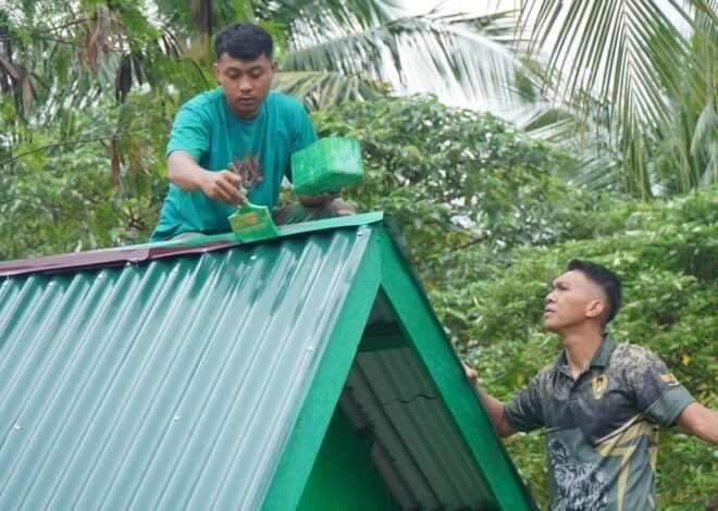 Pengecatan Lisplang dan Kamar Mandi MCK SDN Umbele, Progres TMMD Ke-129 Terus Berlanjut