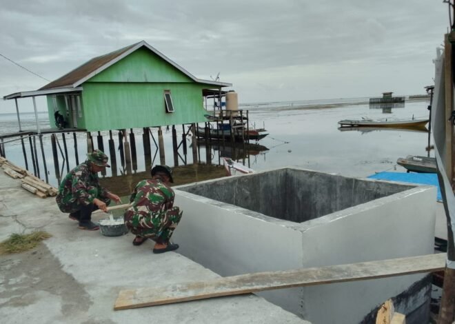 Satgas TMMD Ke-129 Laksanakan Pengaplusan Bak Penampungan Program Manunggal Air Bersih di Desa Umbele