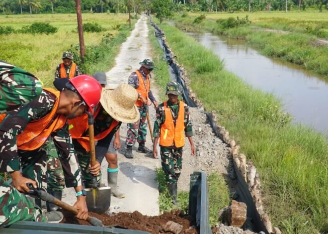 Gotong Royong TNI dan Warga Jadi Kunci Pembangunan Jalan TMMD di Tamban Catur