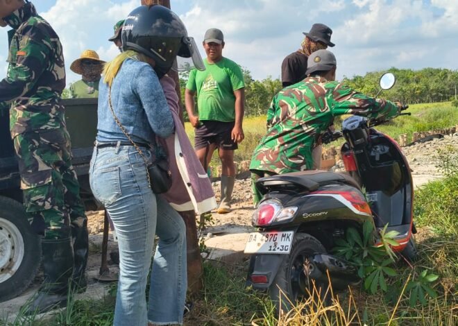 Satgas TMMD Ke-129 Sigap Bantu Warga Melintasi Jalan Rusak di Desa Bandaraya