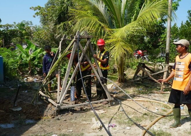 Gotong Royong Satgas TMMD dan Warga Sukseskan Pengurasan Sumur Bor Sasaran 3