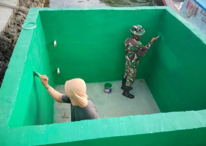 Satgas TMMD Ke-129 Kodim 1311/Morowali Rampungkan Pengecatan Bak Penampungan Air Program Manunggal Air di Desa Umbele