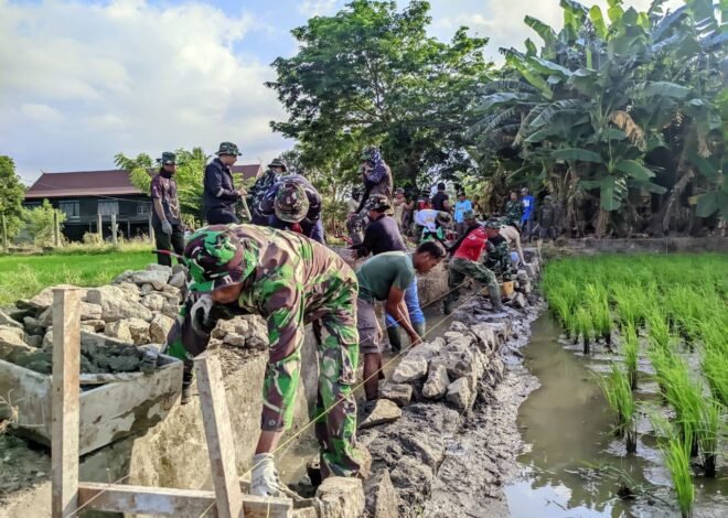 Gotong Royong Satgas TMMD dan Warga Percepat Penyelesaian Sasaran Fisik di Desa Tanratuo