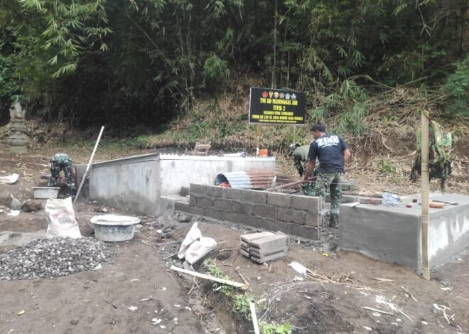 Satgas TMMD Ke-129 Kodim 1626/Bangli Bangun Tembok Bilik Pemandian Umum di Banjar Pule