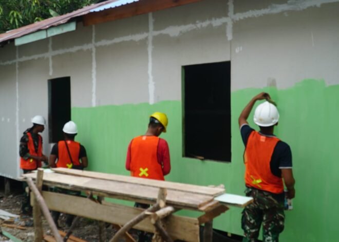 Dukung Program RTLH, Satgas TMMD Ke-129 Genjot Pengecatan Rumah Ibu Wahida