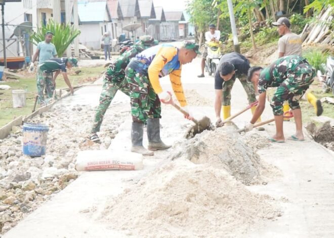 Di Bawah Terik Matahari, Satgas TMMD Ke-129 Tetap Genjot Pembangunan Rabat Beton di Desa Polewali