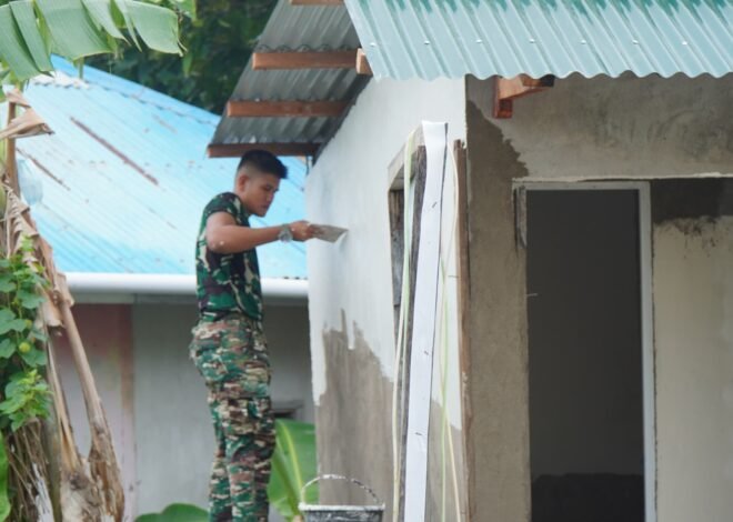 Pembangunan MCK Masjid Quba Terus Berlanjut, Satgas TMMD dan Warga Pasang Keramik Dinding