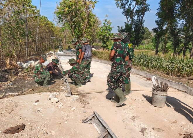 Debu Tak Hentikan Pengabdian, Satgas TMMD Ke-129 Terus Kebut Pembangunan Jalan Rabat Beton