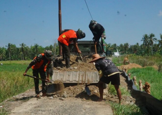 Gotong Royong Satgas TMMD dan Warga Percepat Peningkatan Becros Jalan Desa