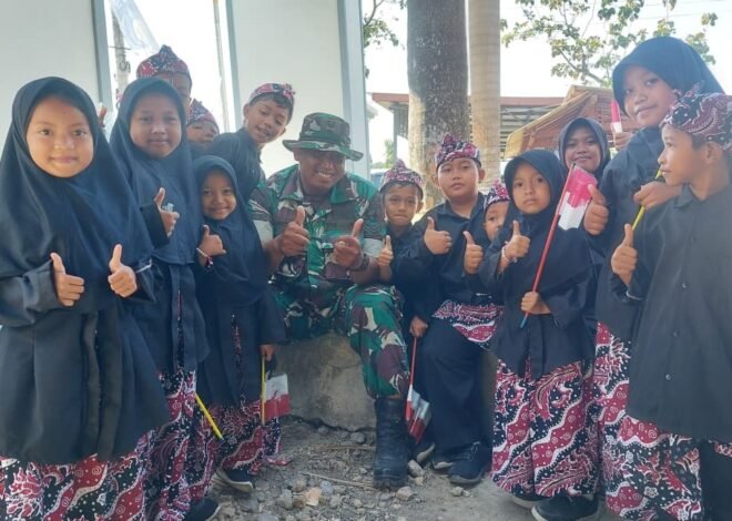 Kehangatan di Luar Tugas Fisik, Sertu Ardianto Personel Satgas TMMD 129 Asyik Canda Tawa Bersama Siswa SD Saat Jam Istirahat