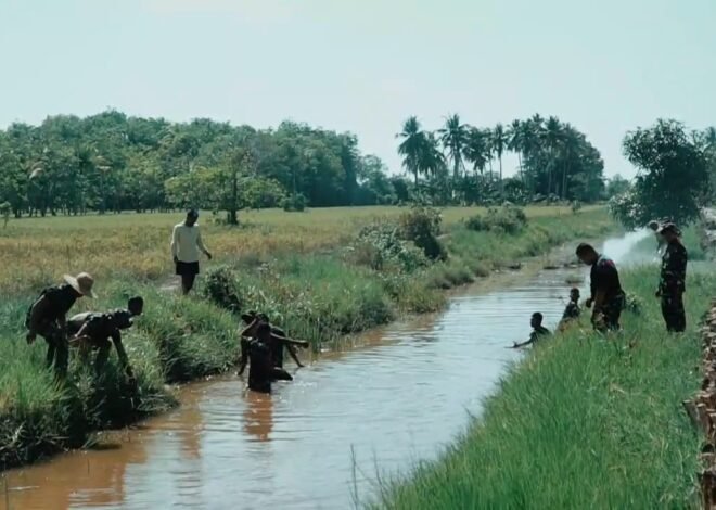 Gotong Royong Satgas TMMD dan Warga, Saluran Air Kampung Patin Dibersihkan