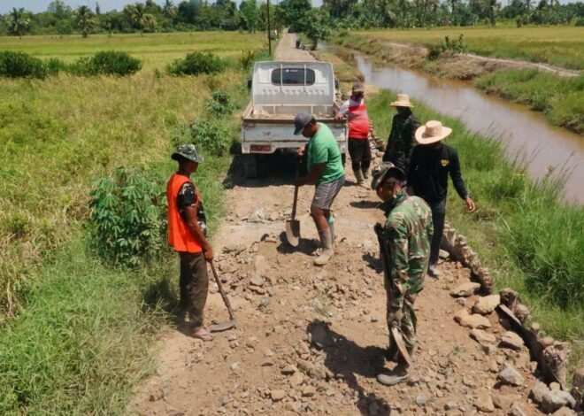 Satgas TMMD dan Warga Perkuat Jalan, Wujudkan Akses Desa yang Lebih Lancar