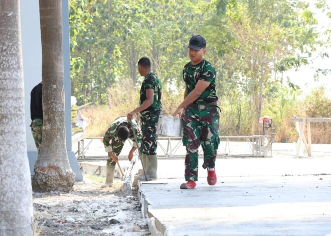 Keringat anggota satgas TMMD ke 129 Kodim 0812 Lamongan terbayar lunas saat begesting jalan dinyatakan di lepas