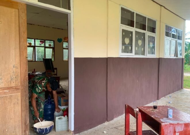 Satgas TMMD Kembali Lanjutkan Pengecatan SMP Negeri 2 Umbele