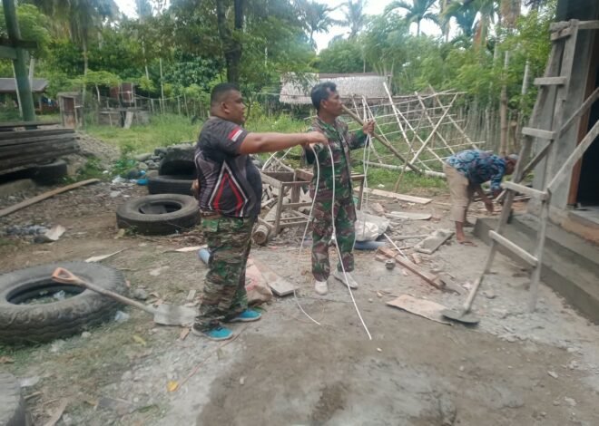 Tahap Finishing TMMD Ke-129, Tim Teknisi Satgas Lengkapi MCK dengan Instalasi Penerangan