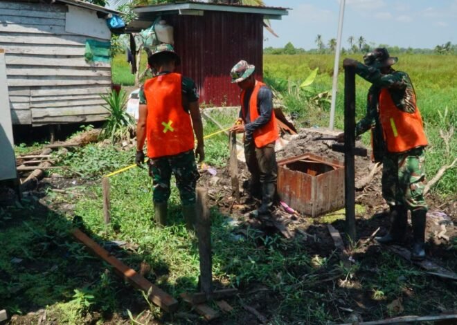 Gotong Royong Satgas dan Warga Awali Pembangunan MCK Sasaran 1 dengan Pembuatan Kuda-Kuda