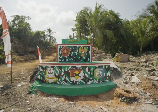 Pengecatan Pagar Empat Desa Kepulauan Umbele Rampung, Lingkungan Semakin Rapi dan Indah