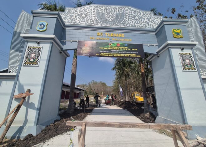hasil jerih payang anggota Satgas TMMD ke 129 kodim 0812 lamongan kini terlihat jelas di gapura desa tlemang. Jalan mulus harapan warga