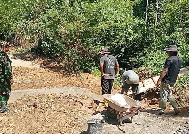 Perkuat Jalan Pertanian, Satgas TMMD ke-129 Bangun Box Culvert Bersama Warga