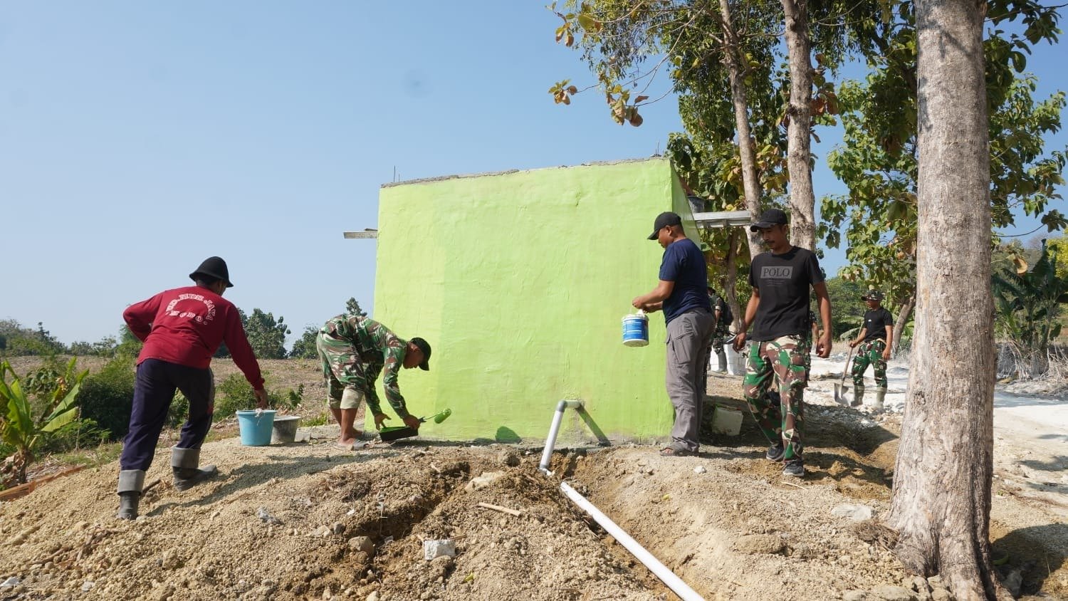 Bikin Suasana Adem dan Asri, Tampilan Warna Hijau Muda Tandon Air Dusun Bakon Karya Satgas TMMD 129 Memikat Hati Warga