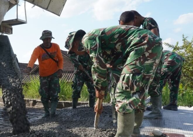 TMMD 129 Ngimbang: Semangat Gotong Royong Mewarnai Pembangunan Jalan Beton Desa Tlemang