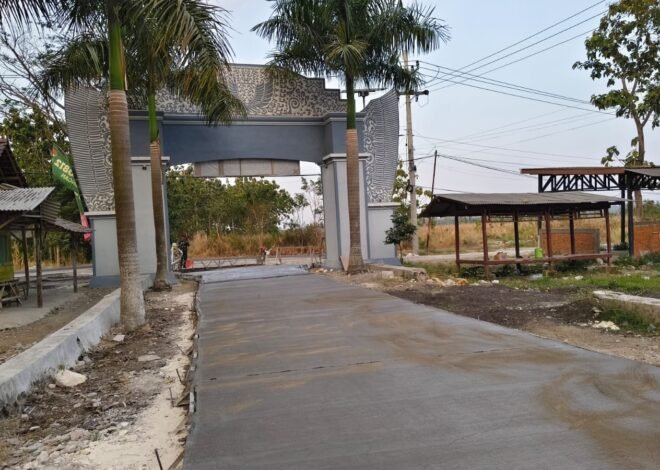 Hujan dan Panas Tak Surutkan Langkah Prajurit Kodim 0812/Lamongan Rampungkan Jalan TMMD 129 Desa Tlemang