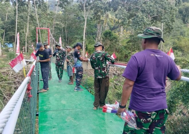 Jembatan Gantung TMMD Ke 129 Kodim Bone Bersolek, Puluhan Bendera Merah Putih Sambut Peresmian