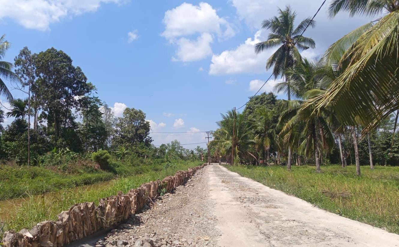 Jalan Baru TMMD Ke-129 Jadi Penggerak Aktivitas Ekonomi Masyarakat Desa Bandar Raya