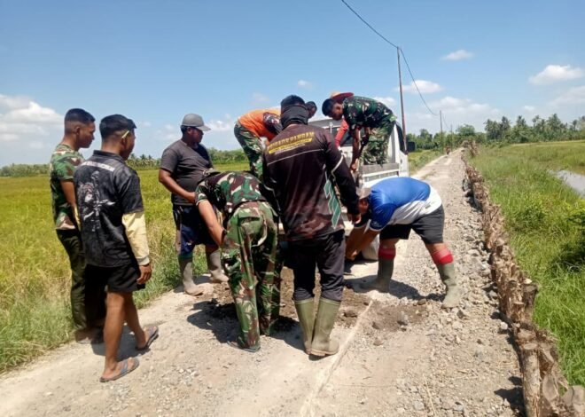 Gotong Royong Satgas dan Warga Percepat Penimbunan Badan Jalan TMMD Ke-129