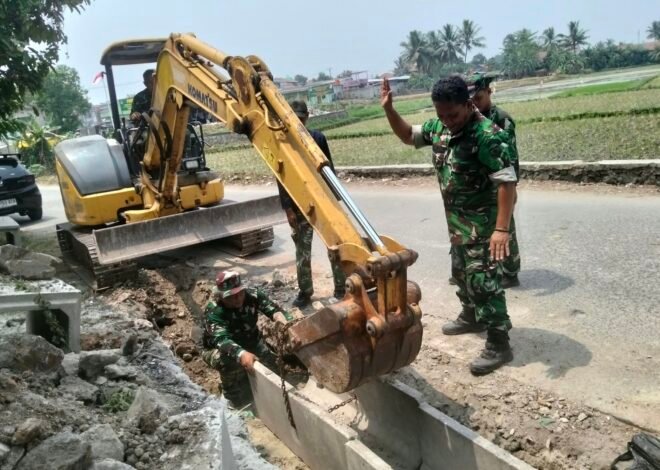 Pembangunan Sistem Drainase Desa Sumur Bandung Melalui U-Ditch oleh Satgas TMMD