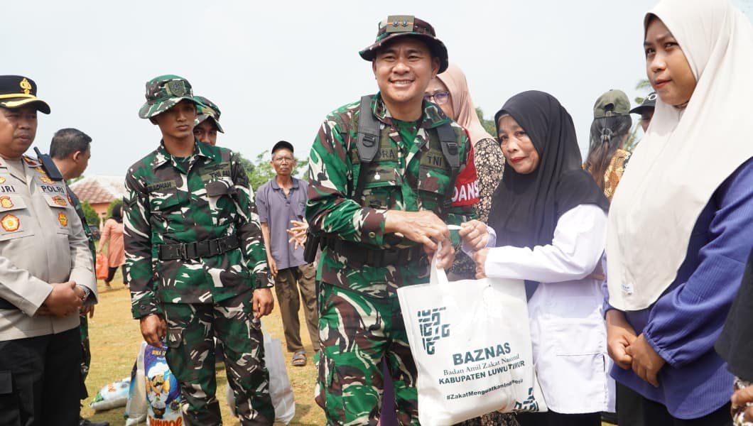 Keceriaan Warga Saat Pembukaan TMMD ke-130 dan Penyerahan Bantuan Sembako